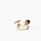 Ivory / Circle@little boy playing on the Ivory Mini Circle Floor Cushion