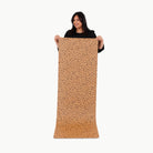 Leopard (on sale)@Woman holding the Leopard Large Home Mat