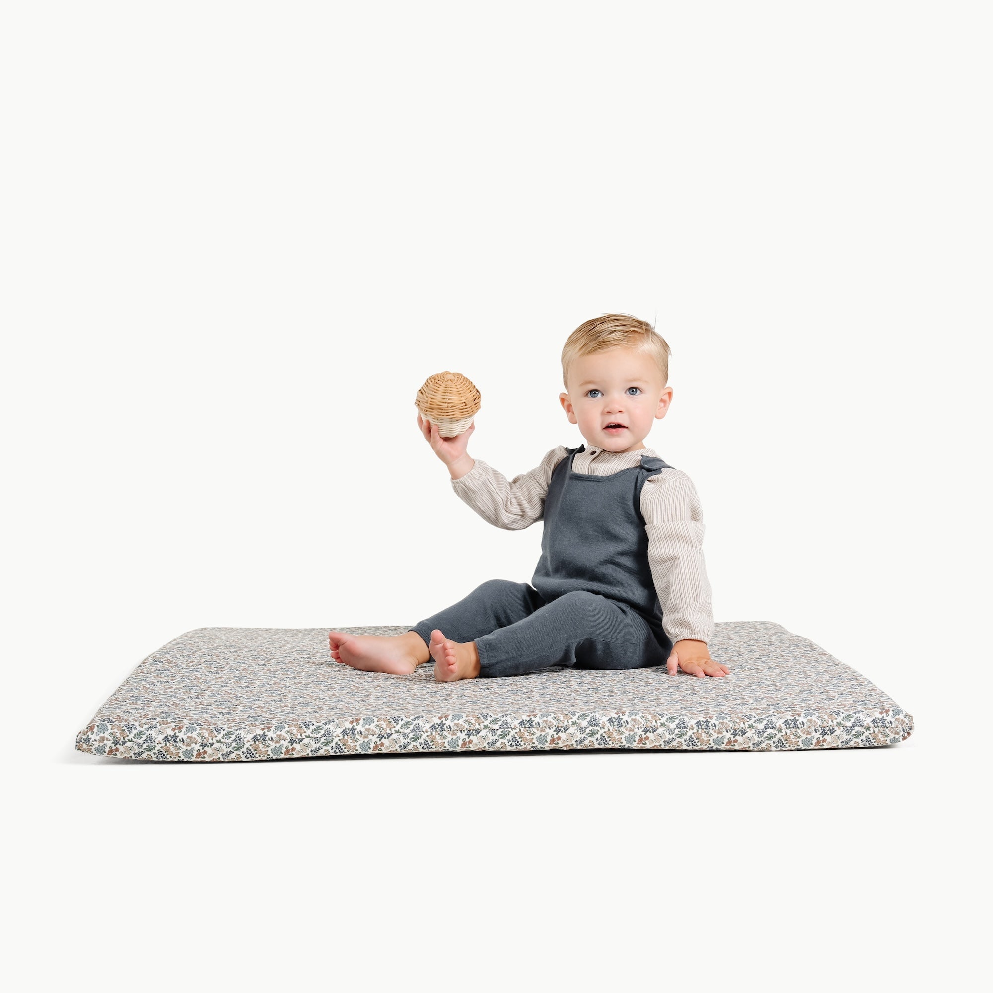 Joanna Bloom / Square@little boy playing on padded mini