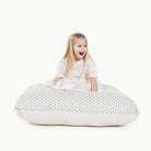 Meadow (on sale) / Square@kid sitting on the meadow square floor cushion