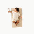 Millet / Micro+@overhead of baby on the millet micro+ mat