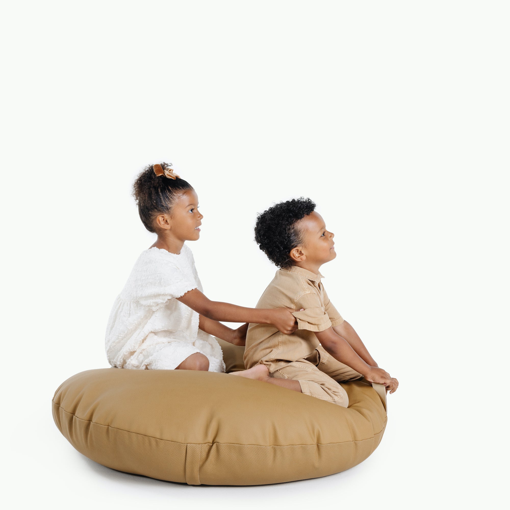 Ochre (on sale) / Circle@Kids sitting on the Ochre Circle Floor Cushion