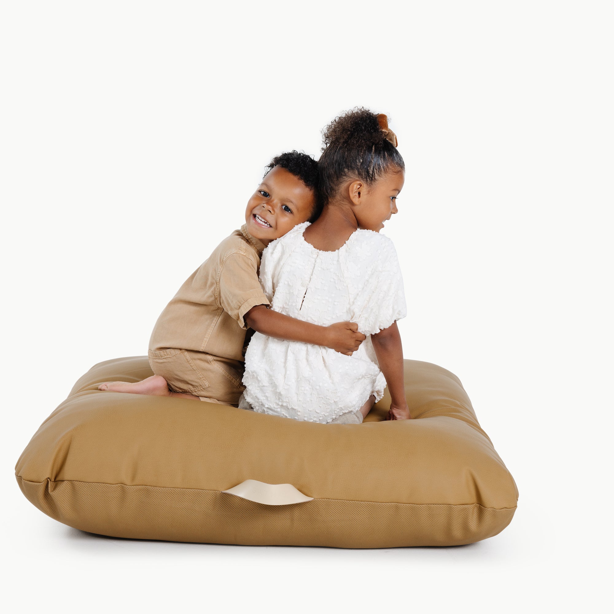 Ochre (on sale) / Square@Kids sitting on the Ochre Square Floor Cushion