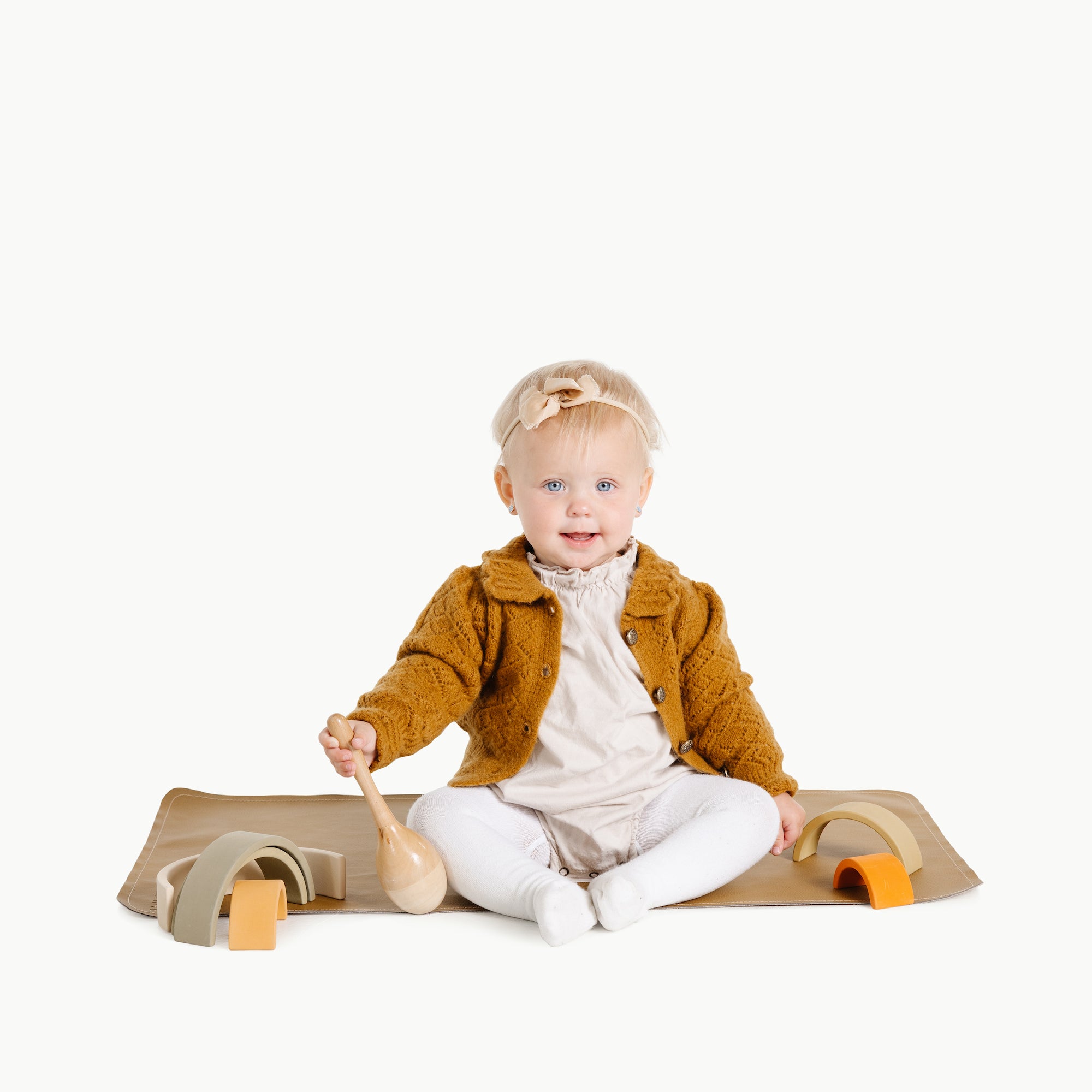Ochre (on sale)@Baby sitting on the Ochre Micro+ mat