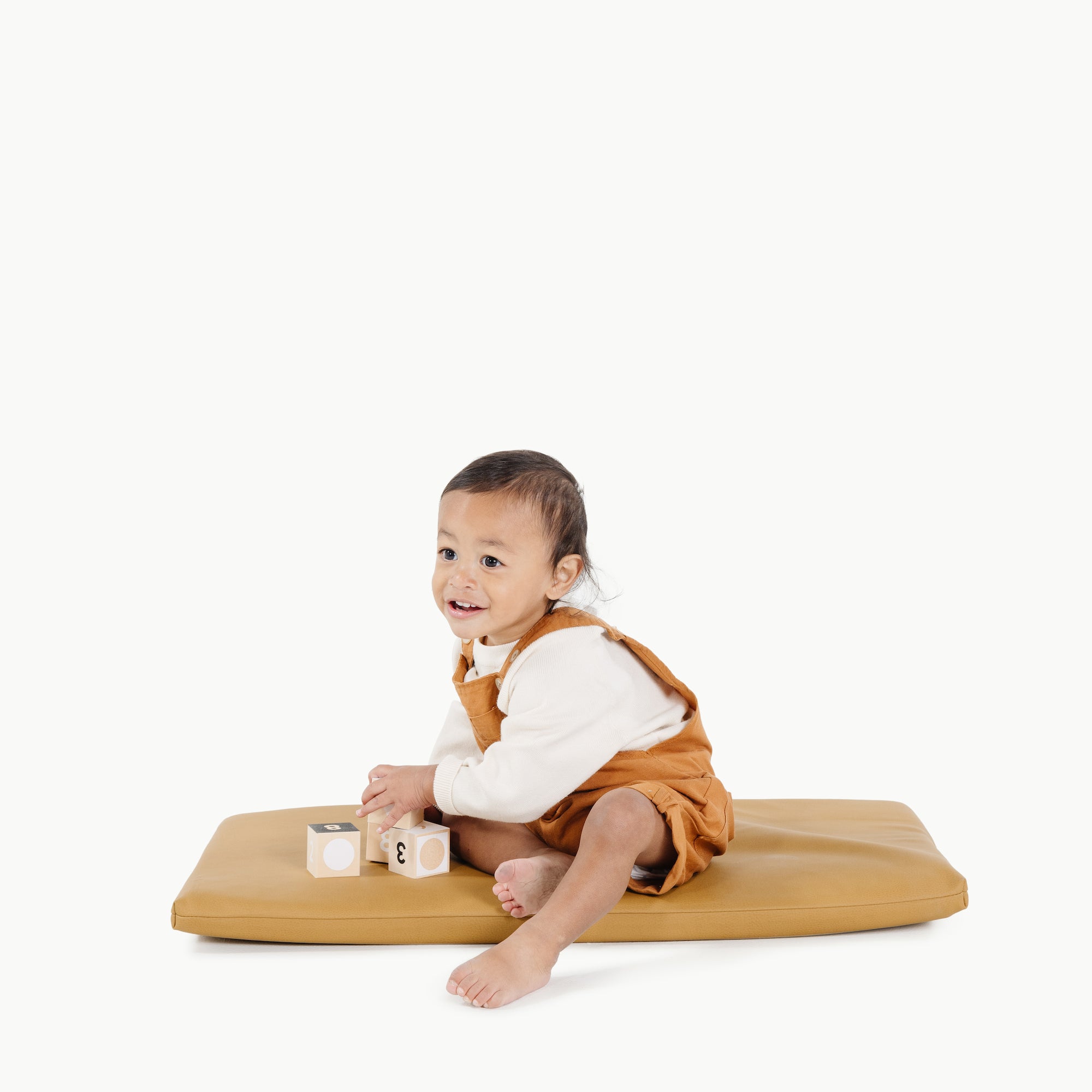 Ochre (on sale)@Baby sitting on the Ochre Padded Micro+