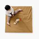 Ochre (on sale) / Square@Overhead of kid playing on the Ochre Padded Mini Square