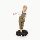 Raven / Circle@Little boy playing on the Raven Mini Circle Floor Cushion 