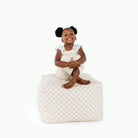 Rook / Square@little girl sitting on pouf
