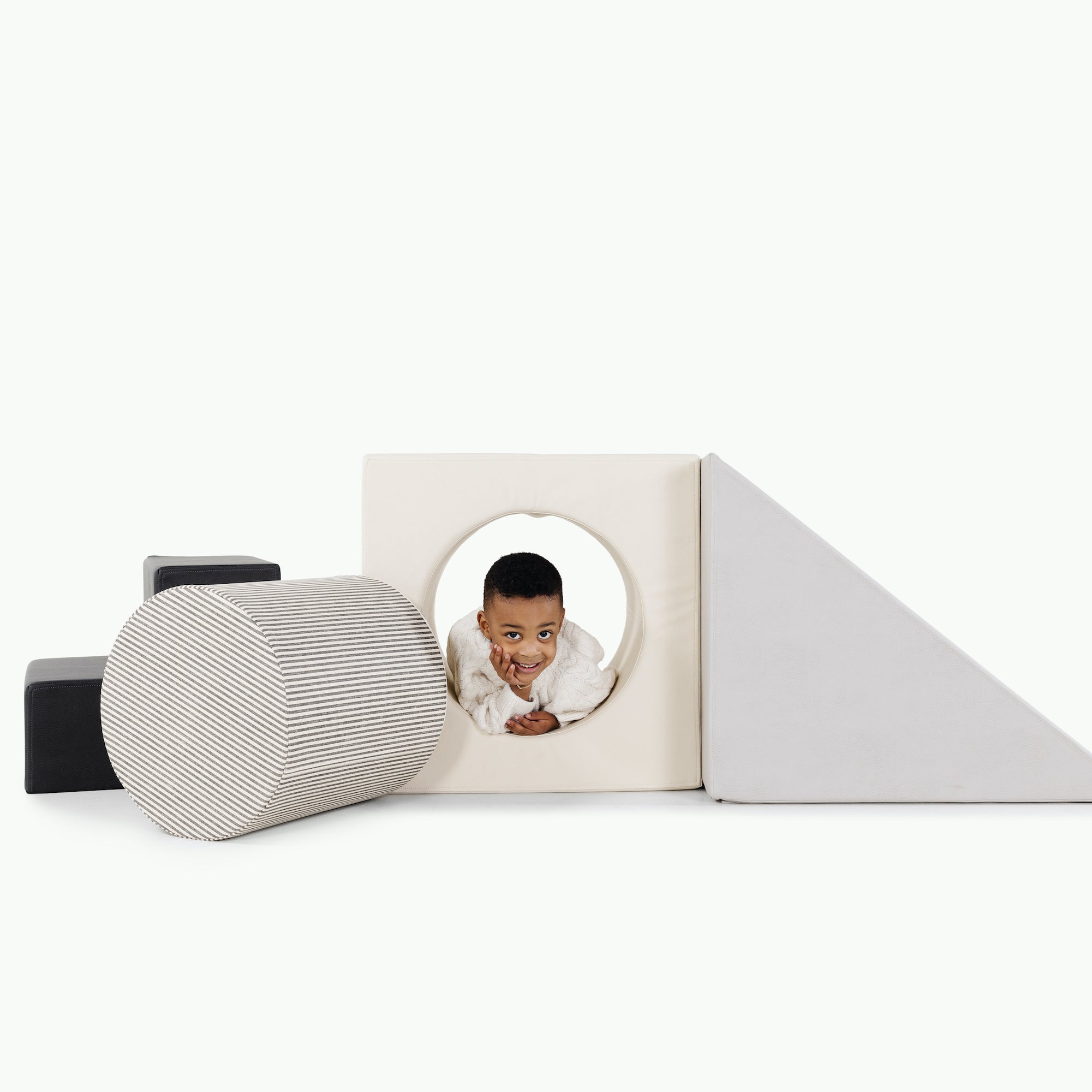 Raven • Ivory • Stone Stripe • Gull@Kid playing on the Stone Stripe Block Playset