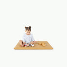 Tassel / Square@little girl playing on padded mat