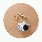 Terra (on sale)@overhead of kid playing on the terra padded midi circle