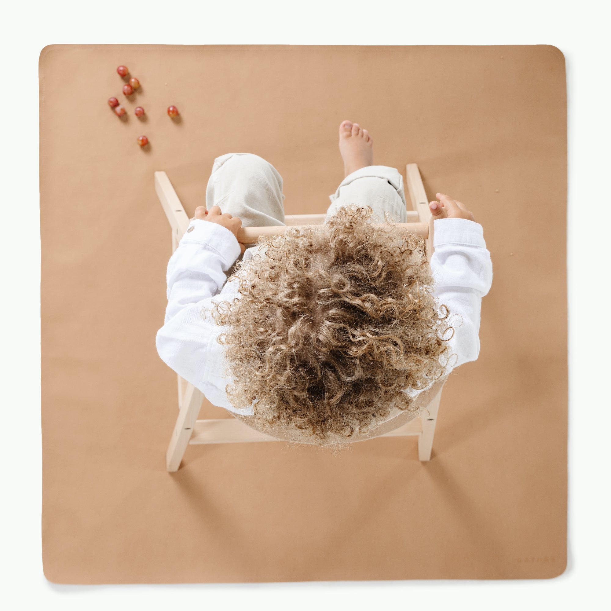 Terra (on sale)@overhead of kid sitting in highchair on mini mat