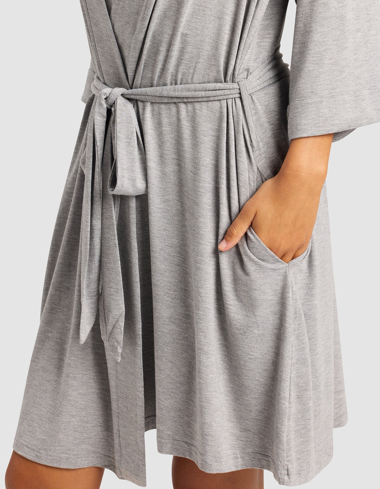 Grey@woman wearing a grey cozy earth robe
