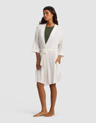 Ivory@woman wearing a Ivory cozy earth robe