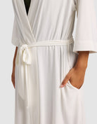 Ivory@woman wearing a Ivory cozy earth robe