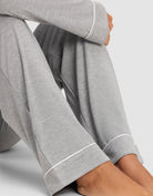 Grey@woman wearing grey cozy earth pajamas