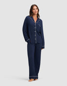 Navy@woman wearing navy cozy earth pajamas 