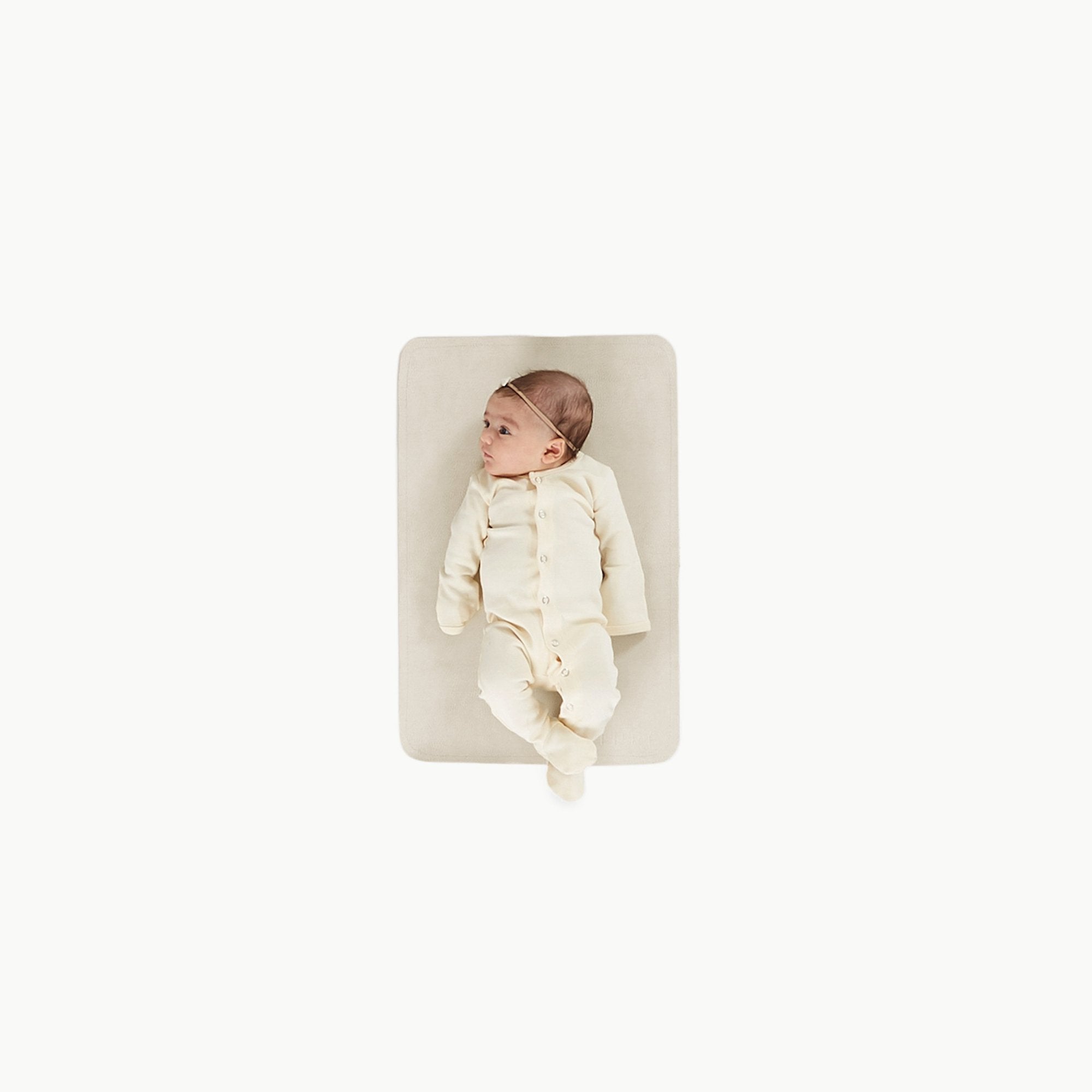 Blanc (on sale)@Overhead of baby on the Blanc Micro Mat