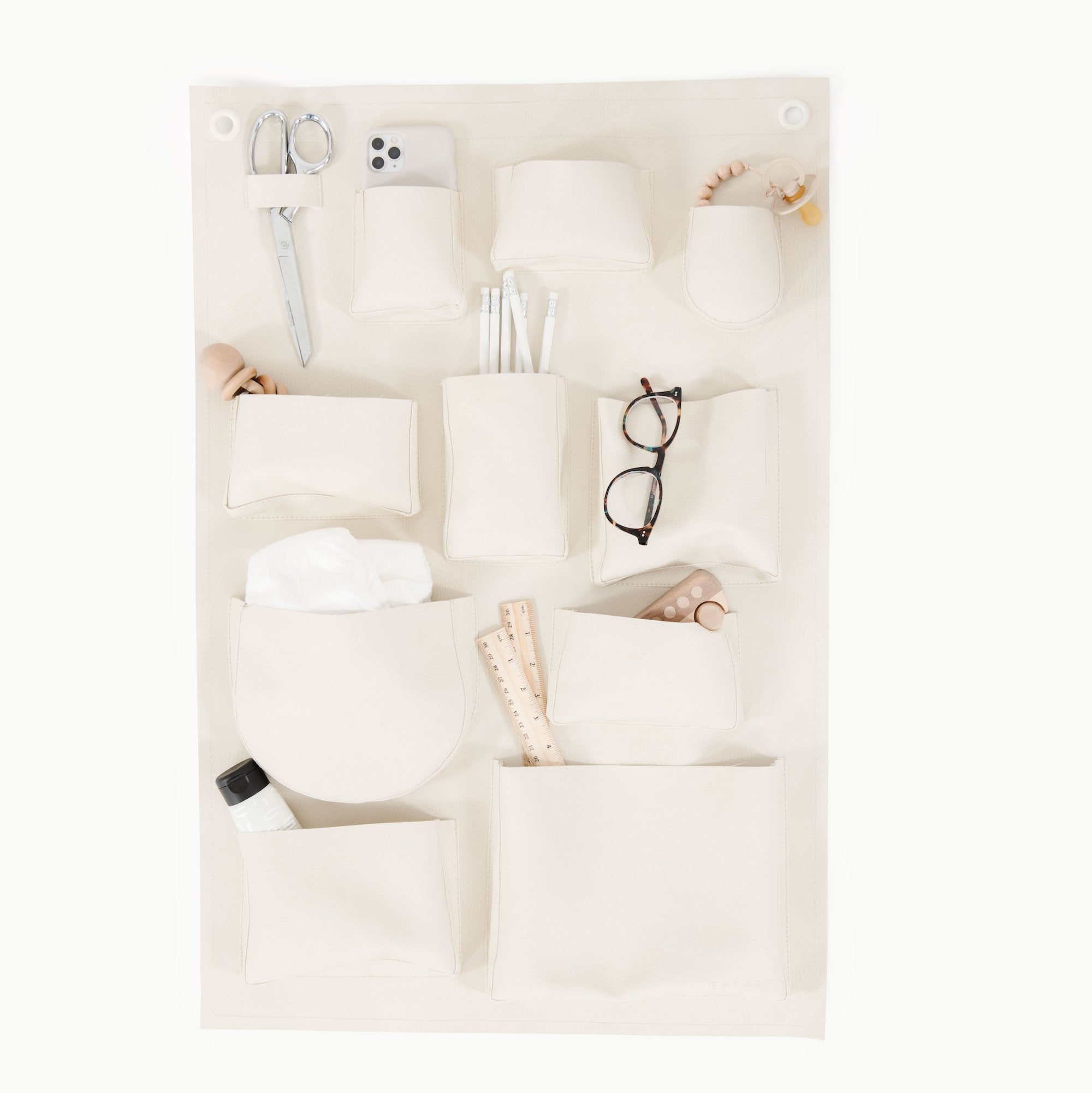 Blanc (on sale)@Flat lay of wall tidy filled with product