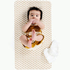 Bloom (on sale)@Overhead of baby laying on the Bloom Micro+ Mat