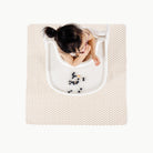 Bloom (on sale)@Overhead of kid in highchair on the Bloom Mini Mat