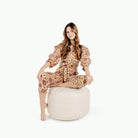 Bloom (on sale) / Circle@Woman sitting on the Bloom Circle Pouf