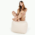 Bloom (on sale) / Square@Woman sitting on the Bloom Square Pouf