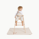 Cafe Stripe@baby in a highchair on the cafe stripe mini