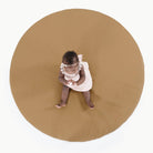 Camel@Overhead of baby sitting on Padded Midi Circle