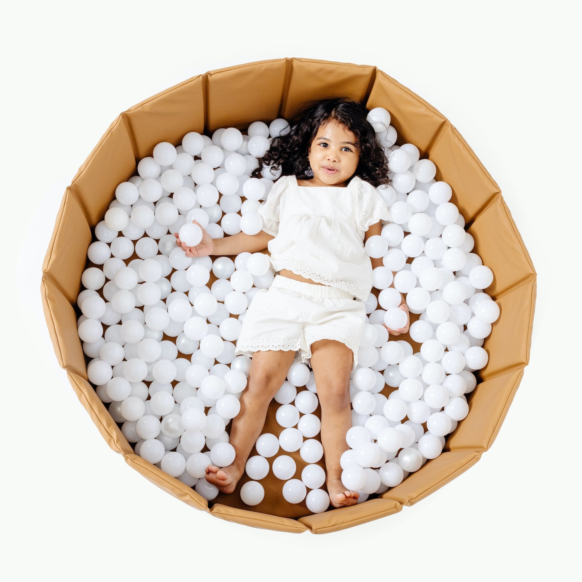 Camel / Ball Pit@overhead of kid playing in the camel ball pit