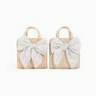 Untanned (on sale)@Untanned and Millet Children's Purses side by side