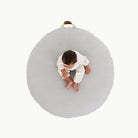 Pewter (on sale) / Circle@Overhead of kid on the Pewter Circle Floor Cushion