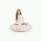 Dove (on sale)@kid sitting on the dove circle floor cushion