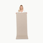 Ember (on sale)@Woman holding the large ember home mat