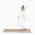 Ember (on sale)@Woman standing on the large ember home mat