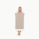 Ember (on sale)@woman holding the small ember home mat