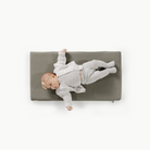 Fern (on sale)@overhead of baby laying on the fern padded micro+
