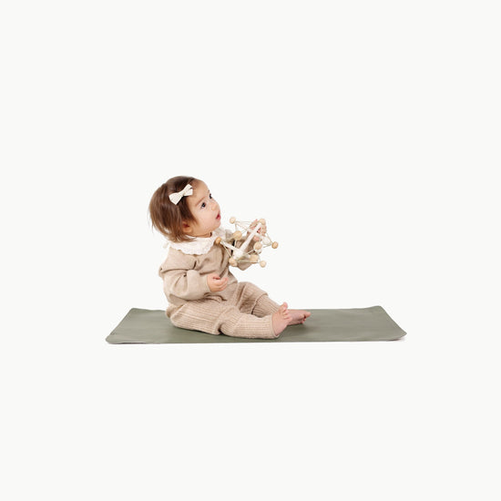 Thyme@Baby sitting on the Thyme Micro+ Mat