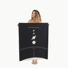 Solar System (on sale)@Woman holding the Solar System Mini+ Mat
