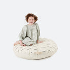 Blanc Dash (on sale) / Circle@Kid sitting on the Blanc Dash Circle Floor Cushion