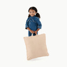 Untanned (on sale) / Square@kid holding the untanned square mini floor cushion