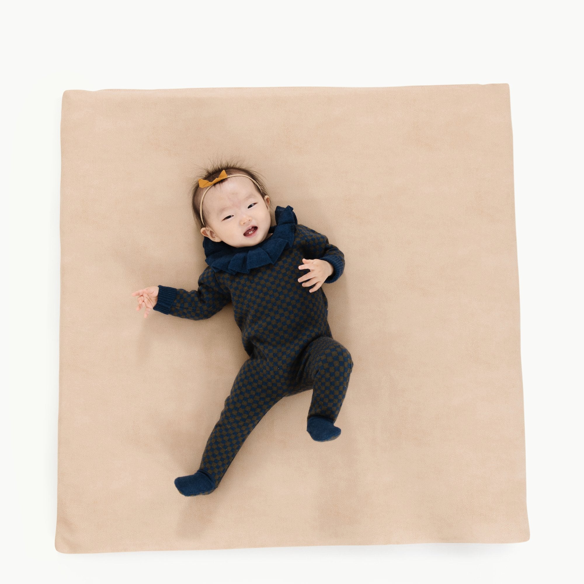 Untanned / Square@Overhead image of baby laying on Untanned Padded Mini Square