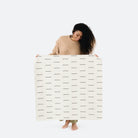 Blanc Dash (on sale)@Woman holding the Blanc Dash Mini Mat