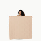 Untanned (on sale) / Square@Woman holding the Untanned Midi Square Mat