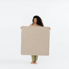 Ember (on sale)@Woman holding the Ember Mini Mat