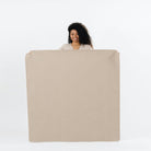 Ember (on sale) / Square@Woman holding the Ember Square Midi Mat