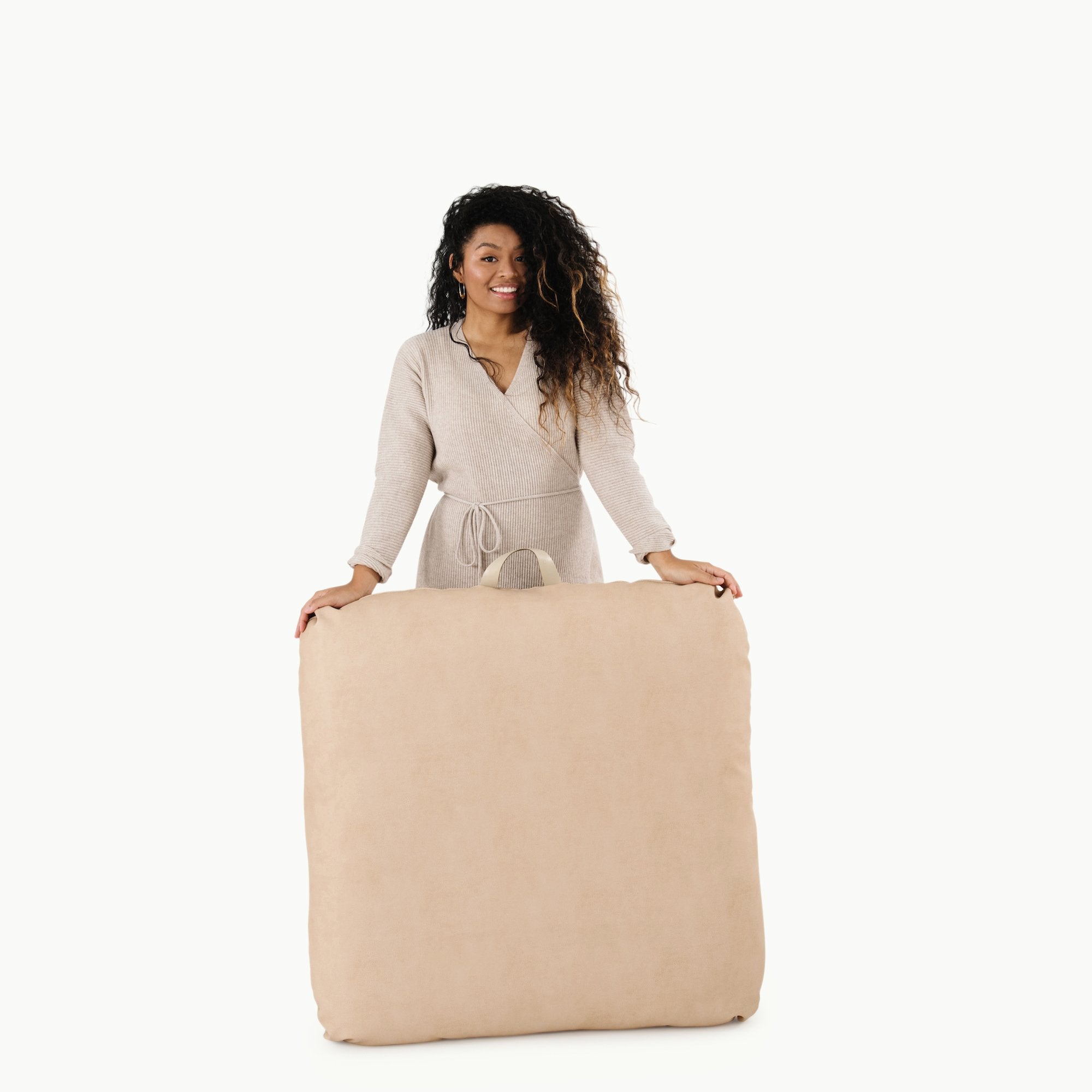 Untanned  (on sale) / Square@Woman holding the Untanned Square Floor Cushion
