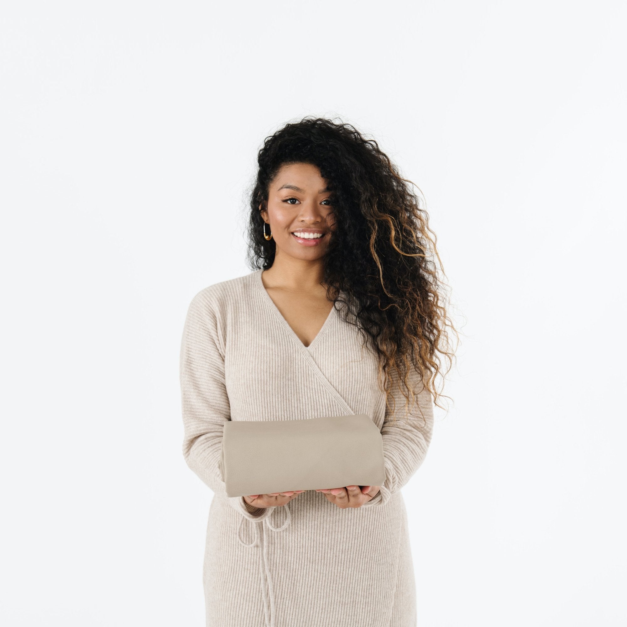 Ember (on sale)@Woman holding the Ember Maxi Mat