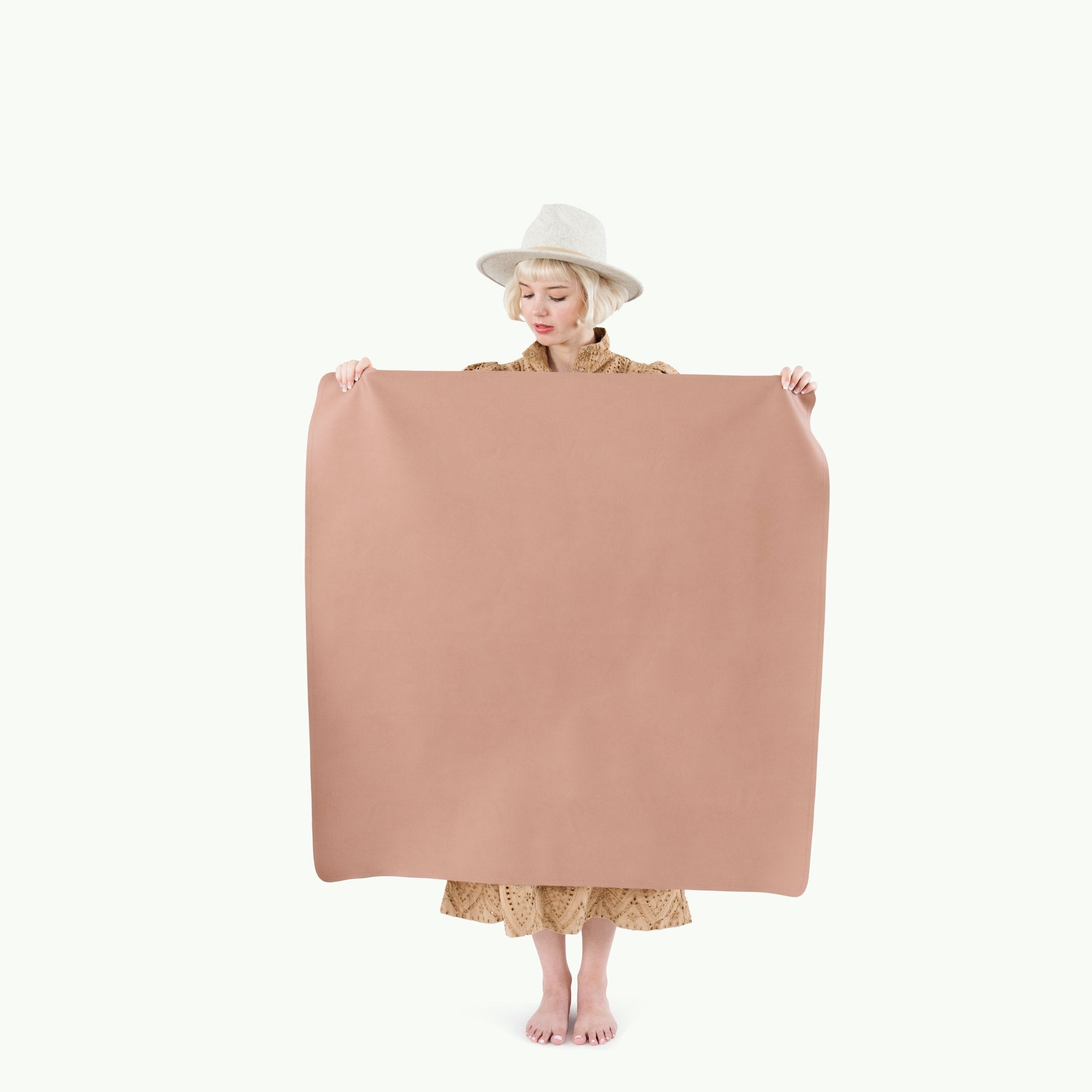 Sienna (on sale)@Woman holding the Sienna Mini Mat