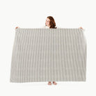 Stone Stripe / 6 Foot@woman holding stone stripe tablecloth